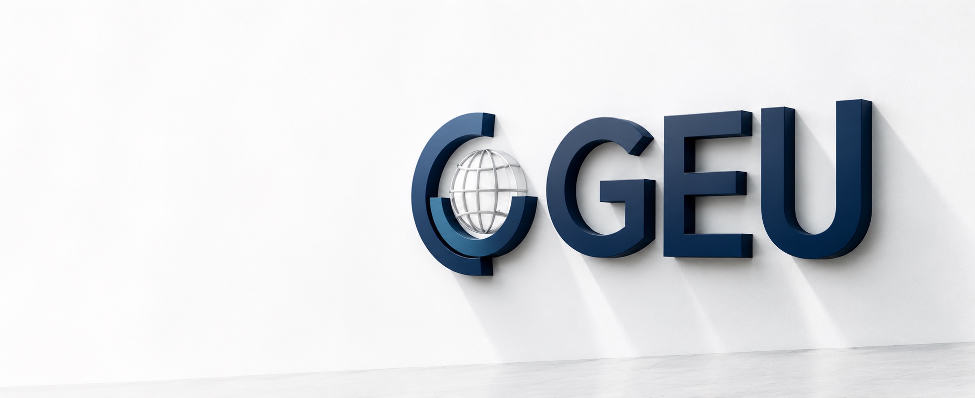 Logo tridimensional GEU en pared blanca